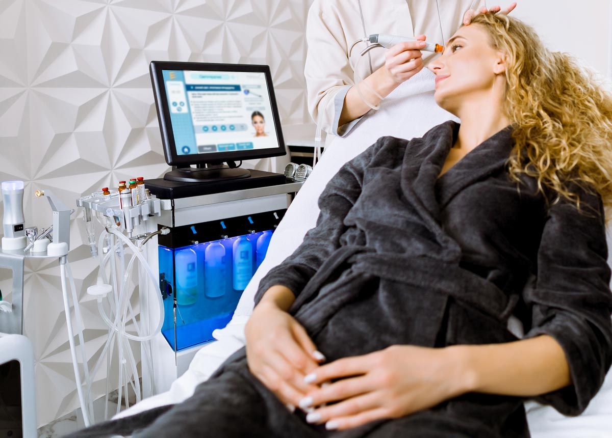 Woman receiving Hydrafacial